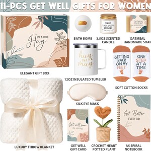 May include: A gift set including a patterned box, a white 12oz insulated tumbler with gold text, a 3.5oz scented candle, oatmeal soap, a bath bomb, cotton socks, a white throw blanket, a silk eye mask, a card, a crochet heart plant, and a notebook.