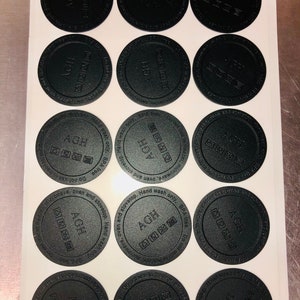 May include: Twelve black round stickers with the text "AGH" and care instructions for the product. The instructions include "Hand wash only, BPA free" and "Do not use in microwave, oven and stovetop."