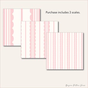 May include: Three pink and white patterned paper scales. The patterns include vertical stripes and scalloped edges. The text "Purchase includes 3 scales" is visible.