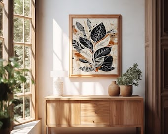 Könnte beinhalten: Ein gerahmter Druck einer stilisierten botanischen Illustration in Schwarzweiß mit orangefarbenen und braunen Akzenten. Der Druck hängt an einer weißen Wand über einem Holzschränk.