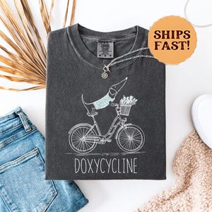 Doxycycline Pun Shirt | Dachshund on Bicycle Tee | Pharmacy Sweatshirt | Pharmacist Gift | Vet Tech Top | Funny Med School Shirt