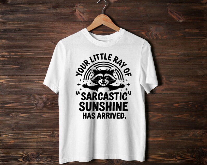 Sarcastic Funny,raccoon quote svg,sarcastic quote svg,Sarcastic Funny SVG,sassy raccoon svg,trendy raccoon svg,your little ray svg,sassy raccoon,sarcastic raccoon,raccoon sarcastic,sublimation raccoon,raccoon quote,sarcastic sunshineYour little ray of sarcastic sunshine svg, Sarcastic svg, Has arrived svg, funny raccoon svg, sassy raccoon , trendy design sublimation PNG
Your Little Ray Of Sarcastic Sunshine Has Arrived SVG PNG, Retro Funny Raccoon Shirt Design, Sarcastic Svg, Sassy Meme