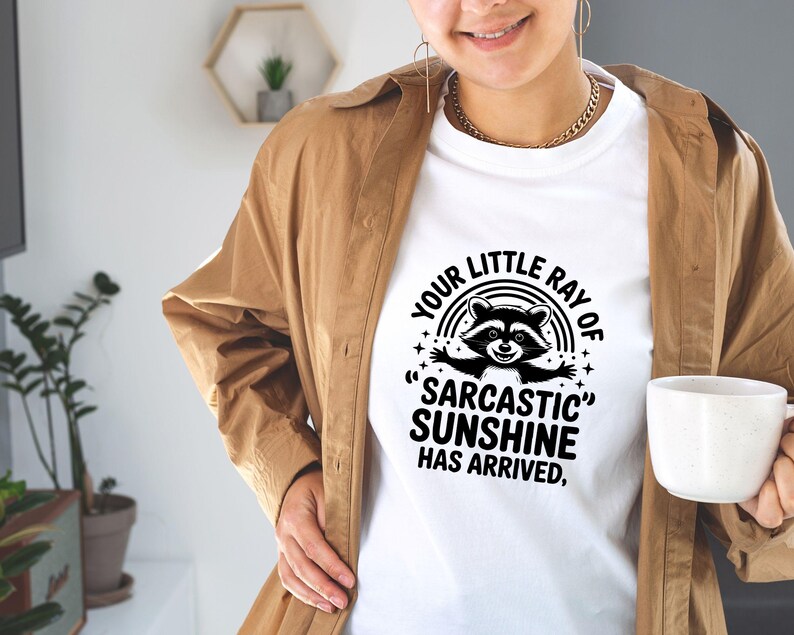 Sarcastic Funny,raccoon quote svg,sarcastic quote svg,Sarcastic Funny SVG,sassy raccoon svg,trendy raccoon svg,your little ray svg,sassy raccoon,sarcastic raccoon,raccoon sarcastic,sublimation raccoon,raccoon quote,sarcastic sunshineYour little ray of sarcastic sunshine svg, Sarcastic svg, Has arrived svg, funny raccoon svg, sassy raccoon , trendy design sublimation PNG
Your Little Ray Of Sarcastic Sunshine Has Arrived SVG PNG, Retro Funny Raccoon Shirt Design, Sarcastic Svg, Sassy Meme