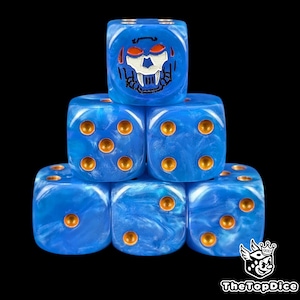 May include: A stack of six blue dice with a marbled effect. Each die has gold-colored pips and a skull design on one face. The dice are set against a black background.