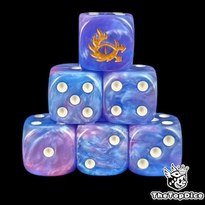 May include: Six blue and purple marbled dice with white pips are stacked. One die has a gold dragon eye symbol. The dice are set against a black backdrop. The logo "TheTopDice" is in the bottom right corner.