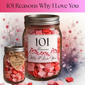 May include: Two glass jars filled with pink and red paper squares. The larger jar has a label that reads "101 Reasons Why I Love You." The smaller jar has a tag with the same text. The jars are on a light background with floral accents.