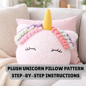 May include: A plush unicorn pillow with a yellow horn, closed eyes, and a multi-colored mane. The pillow is white and fluffy, with the text "PLUSH UNICORN PILLOW PATTERN STEP-BY-STEP INSTRUCTIONS" in a black font.