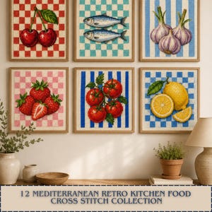 May include: A collection of six framed cross-stitch artworks featuring food motifs including cherries on a red checkered background, fish on a teal checkered background, garlic on blue stripes, strawberries on pink checks, tomatoes on blue stripes, and lemons on blue checks.