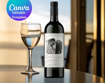 May include: A wine bottle with a custom label featuring a black and white photo of a couple, the date 12/03/2027, and the text "Emma & James Cheers to forever!" A wine glass with white wine is next to the bottle. The image also includes a Canva Editable Template logo.