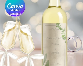May include: A bottle of Sauvignon Blanc wine with a custom label that reads "Cheers to Love" and the names Emma & James. Two champagne flutes are clinking, and two wedding rings are visible.