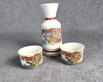 Japanese sake set one pitcher with two cups, pheasant design, Otagiri