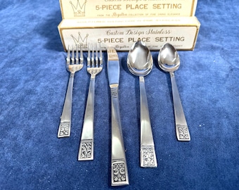 MCM Royalton Custom Design flatware set 40 pieces, Ornate scroll medallion tapered handle