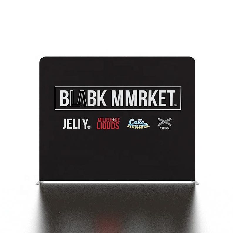 May include: Black backdrop with white text that reads "BLAK MMRKET" and the text "JELIY."  Below the text are four logos: "MILKSHAKE LIQUIDS", "Cake Monster", and "CHURR".