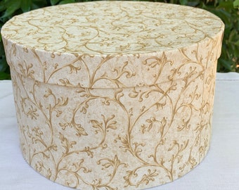 Large golden scroll wallpaper covered hat box, mid 19th century style