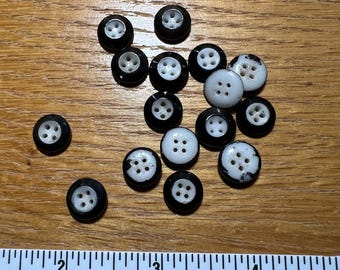 Black ringer or inkwell buttons, black and white. Set of sixteen (16)