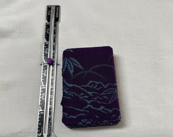 Purple and teal jacquard silk needle book