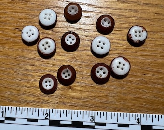 Brown ringer or inkwell buttons, brown and white. Set of twelve (12)