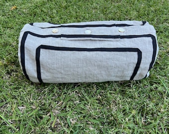 Mid 19th century linen travel bag, black trim