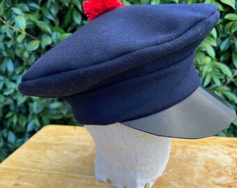 Blue wool outdoorsman cap with leather brim, 19th century