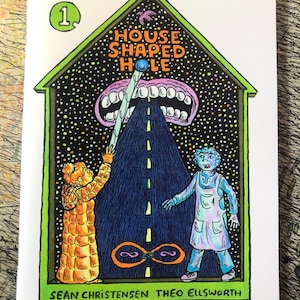 May include: A comic book cover with the title "HOUSE SHAPED HOLE" inside a green house outline. The illustration features a road leading to a mouth, two figures, and the authors' names.