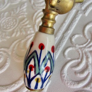 Hand Painted Ceramic Finger Pull in Brass