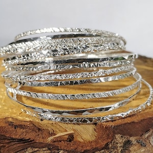 Stacking bangles (set of 7): Handmade, hammered sterling silver