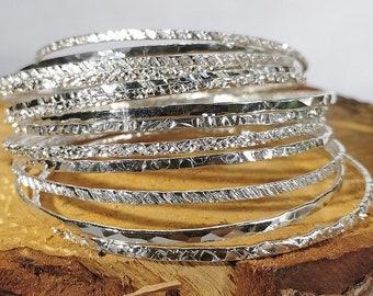 Stacking bangles (set of 7): Handmade, hammered sterling silver