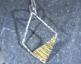 Sterling silver textured diamond-shaped necklace with asymmetric brass triangle: Handmade, unique, geometric jewellery