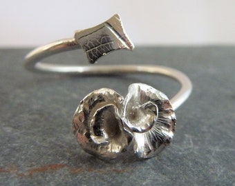 Adjustable silver ring with sterling silver textured leaf and silver rose flower: Handmade sterling silver.  One size fits all ring