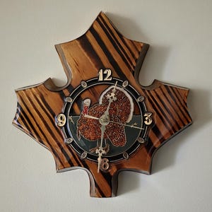 May include: A set of three ceramic mugs with a speckled, matte finish. The mugs are in shades of cream, light gray, and dark gray. Each mug has a simple, minimalist design, perfect for coffee or tea.