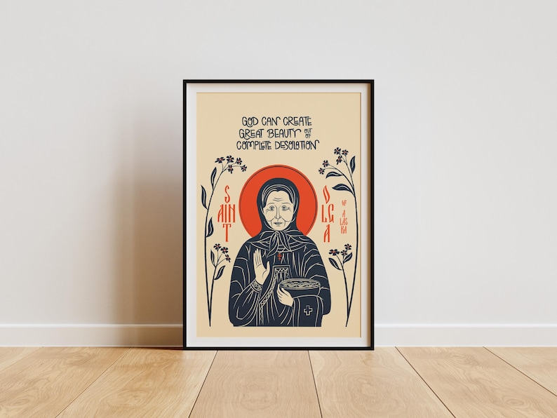 Puede incluir: Una l&aacute;mina art&iacute;stica enmarcada con una ilustraci&oacute;n estilizada de Santa Olga en l&iacute;neas azul oscuro sobre un fondo beige. El texto dice "GOD CAN CREATE GREAT BEAUTY OF COMPLETE DESOLATION" con "SAINT OLGA" verticalmente a los lados y detalles florales.