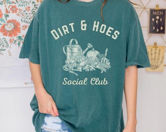 Camiseta de jardinería con tierra y azadas, divertido juego de palabras sobre jardinería