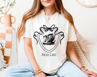 Vintage T-shirt met comfortabele kleuren Zwanenmeer: T-shirt met retro vogelprint