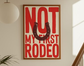 Sztuka kowbojska: Nie mój pierwszy wydruk rodeo, plakat z czerwoną typografią, sztuka ścienna w stylu południowo-zachodnim (wersja cyfrowa do pobrania w pionie)