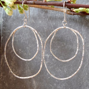 organic double hoop swinging earrings in sterling silver image 1