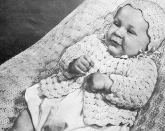 Modello PDF vintage per uncinetto da neonato, composto da maglioncino, cappellino e scarpine.