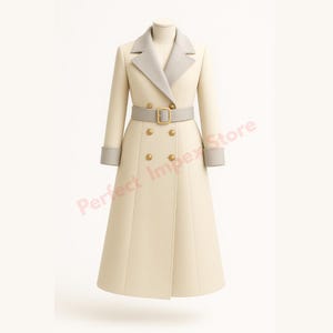 May include: Cream-colored double-breasted coat with a gray collar, cuffs, and belt. The coat features gold buttons and a matching belt with a gold buckle. The coat is displayed on a mannequin.