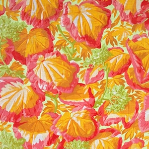 May include: A vibrant floral pattern featuring large leaves in shades of orange, yellow, and pink, with white accents. The leaves are set against a light green background, creating a lively and colorful design.