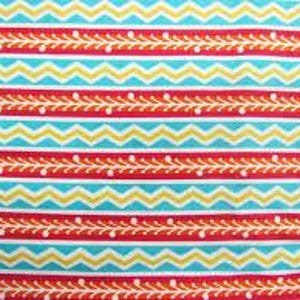 May include: Red, blue, and yellow chevron pattern fabric with a white floral design. The fabric has a repeating pattern of stripes and chevrons.