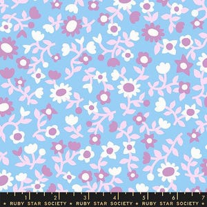 May include: A patterned fabric in light blue, featuring a floral design with pink and white flowers, and pink stems and leaves. The text "RUBY STAR SOCIETY" is at the bottom.