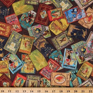 May include: A fabric print featuring a collage of vintage storybook covers with colorful illustrations and titles like Peter Pan, Pinocchio, and Sleeping Beauty, positioned above a ruler showing 22 inches of length for scale.