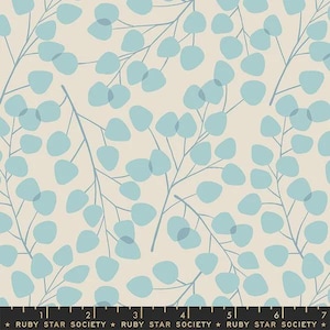 May include: A fabric with a repeating pattern of light blue eucalyptus leaves and branches on a cream background. The text "RUBY STAR SOCIETY" is printed along the bottom edge.