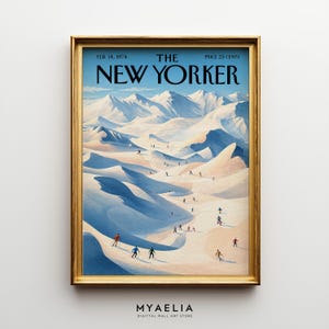 May include: A framed wall art print of a vintage The New Yorker magazine cover dated Feb. 14, 1974. The illustration depicts a vast, snow-covered mountain landscape with numerous small figures skiing down slopes under a light blue sky.