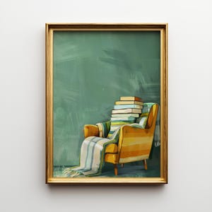 Könnte beinhalten: Ein gerahmter Kunstdruck zeigt eine gemütliche Leseecke. Ein orange-gelb gestreifter Sessel ist mit einer gestreiften Decke und einem Stapel Bücher bedeckt. Der Hintergrund ist ein strukturiertes Teal-Grün.