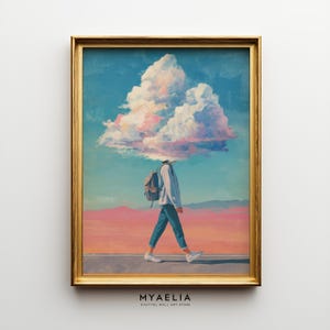 May include: A framed art print featuring a surreal landscape. A person walks on a road with a cloud in place of a head, wearing a backpack, blue jeans, and a white shirt. The sky is blue with a large cloud, and the background is pink.