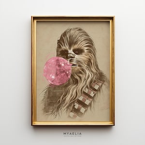 May include: A framed art print showing a sepia-toned illustration of Chewbacca with a pink bubblegum bubble. The artwork is in a gold frame and includes the text "MYAELIA DIGITAL WALL ART STORE".