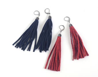 Leather tassel earrings in tomato red and navy blue