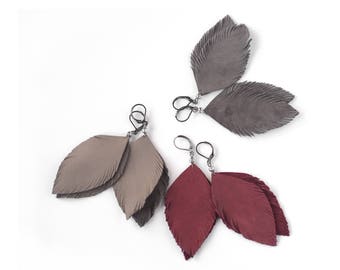 Suede leather feather earrings in latte brown and red wine. Leather feather earrings