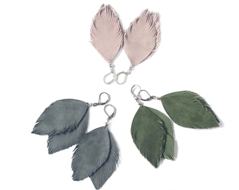 Suede leather feather earrings in pale pink, moss green or pigeon grey.