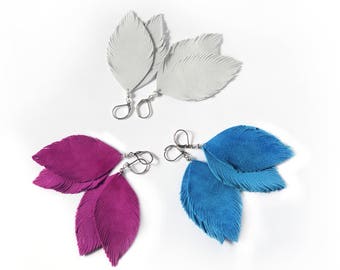 Suede leather feather earrings in light grey, fuchsia pink or bright blue. Leather feather earrings